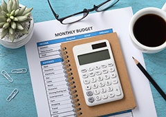 Patient in Waverly checking budget for dental implants